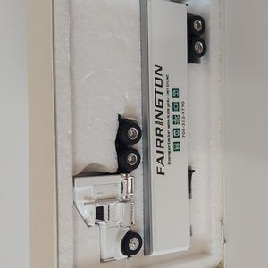 Ertl cab with trailer  new , highly detailed . Diecast metal.